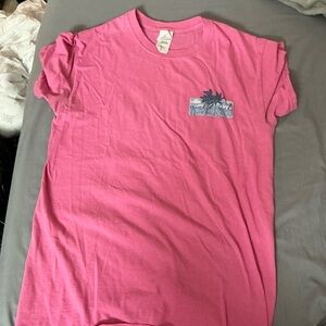 Vintage-Inspired Pink Short Sleeve Tee with Palm Graphic